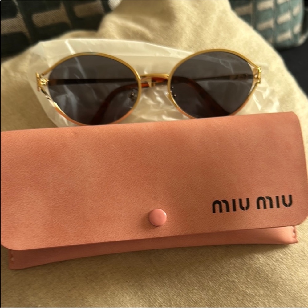 Miu Miu Gold Frame Sunglasses with Pink Case and Dark Lenses